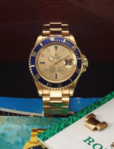 Rolex Submariner 16618-GOLD-SERTI